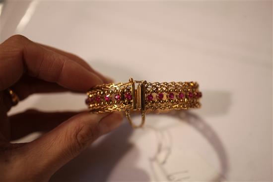 A Middle Eastern 18ct gold and ruby bracelet,